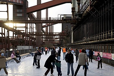 Ice-skating in front of the disused coking plant Zollverein, Essen, NRW, Germany