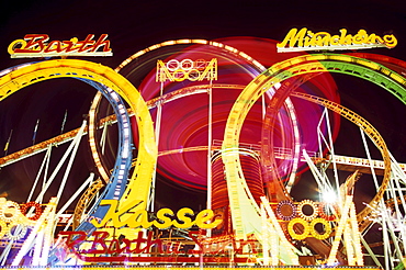 Amusement rides at Oktoberfest (Octoberfest Munich Beer Festival), Munich, Germany, Europe