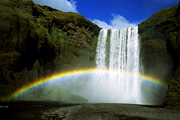 Rainbow over Skogafoss Waterfall, Iceland, Atlantic Ocean