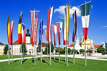 Flags on the Kapellplatz, Chapel Square with Gnadenkapelle Chapel in Altoetting, Lower Bavaria, Germany, Europe