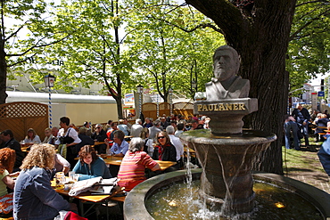 Beer garden at the Paulaner Fountain during Auer Dult market in May, Mariahilfplatz Square, Munich, Bavaria, Germany, Europe