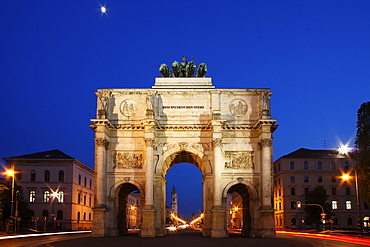 View through Siegestor, Victory Gate, along Ludwigstrasse Street towards St. Ludwig University Church, Schwabing, Munich, Upper Bavaria, Germany, Europe