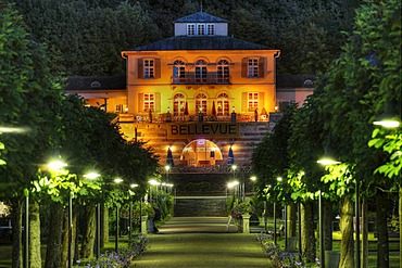 Kurpark state baths in Brueckenau, view toward Hotel Restaurant Bellevue, night shot, Bad Brueckenau, Rhoen Mountains, Lower Franconia, Bavaria, Germany, Europe