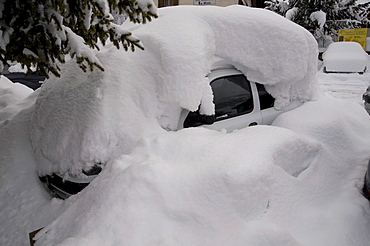 Car buried under a pile of snow, Arabba, Bolzano-Bozen, Dolomites, Italy, Europe