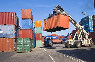 Freight Container being loaded onto truck in Neuss Harbour, Germany