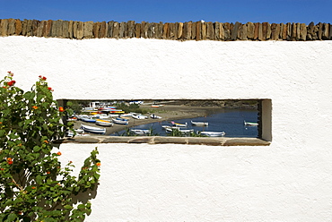 Bay viewed through a rectangular panorama window on the former house of surrealist painter Salvador Dali and his wife Gala in Port Lligat near Cadaques, Catalonia, Spain