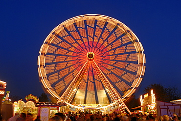 A big wheel on a annual fair - Baden Wuerttemberg Germany Europe.