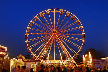 A big wheel on a annual fair - Baden Wuerttemberg Germany Europe.