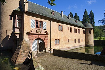 The moated castle Mespelbrunn is located in a remote side valley of the Elsava valley in Spessart, Bavaria, Germany.