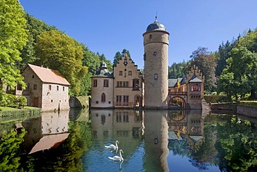 The moated castle Mespelbrunn is located in a remote side valley of the Elsava valley in Spessart, Bavaria, Germany.