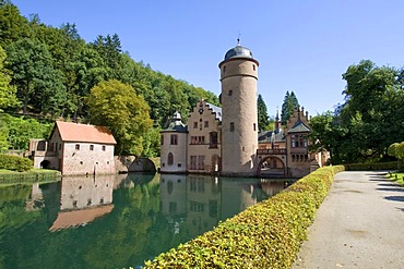 The moated castle Mespelbrunn is located in a remote side valley of the Elsava valley in Spessart, Bavaria, Germany.