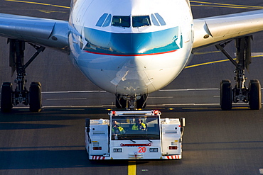 Airbus being taxied at Frankfurt International Airport, Frankfurt, Hesse, Germany, Europe