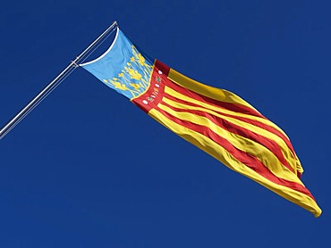 The flag of the region Valencia, Spain,