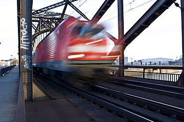 German Rail train driving over a bridge fast, Hesse, Germany, Europe