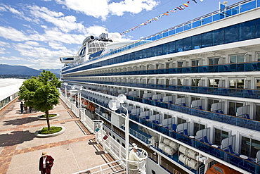 The passenger cruise liner "Diamond Princess" docked in front of the Pan Pacific Hotel in Vancouver, British Columbia, Canada, North America