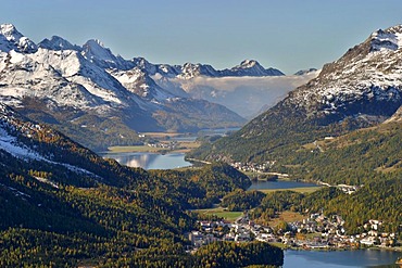 View from Muottas Muragl towards the Engadin lakes and the main valley of the Oberengadin. In the background the typical fog of Maloja.