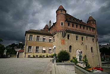 Looming thunderstorm and black clouds behind the Saint-Maire castle in the old suburbs of Lausanne, Waadt, Switzerland