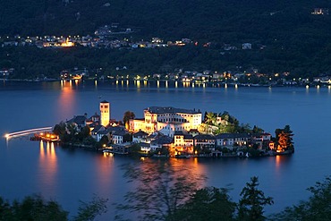 Orta San Giulio with its 20 chapels on Sacro Monte, dedicated to the life of Francis of Assisi, and the isle of San Giulio with its Romanesque Basilica, Lago d'Orta, Piedmont, Italy