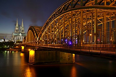 The steel construction of the Hohenzollern bridge and the cathedral in the background, Cologne, NRW, Germany