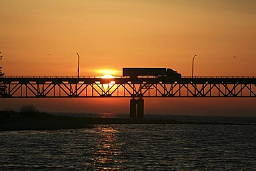 Truck driving across Mackinac Bridge across the Straits of Mackinaw between Mackinac City and St Igance, Michigan, USA