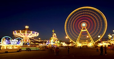 Fun fair with chairoplane and Ferris wheel