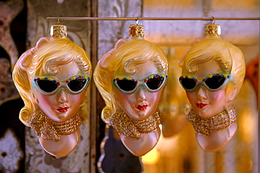 Retro ornaments from the 1950s, three blonde woman wearing sunglasses and scarf and red purse