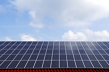 Photovoltaic cells, solar panels installed on a roof, Oberruesselbach, Middle Franconia, Bavaria, Germany, Europe