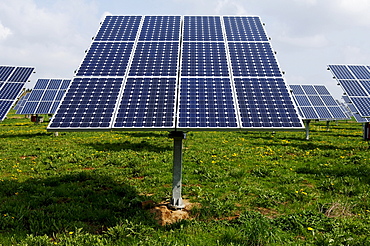 Photovoltaic cells, solar panels mounted in a field, Oberruesselbach, Middle Franconia, Bavaria, Germany, Europe