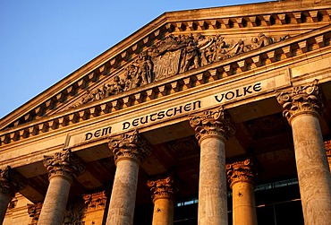 Writing, Dem deutschen Volke, The German People, detail on the Reichstags or parliament building in evening light, Berlin, Germany, Europe