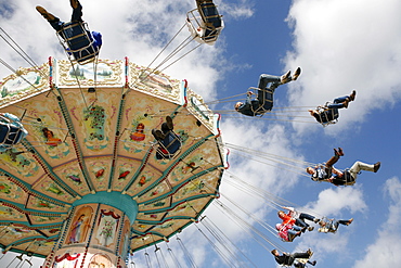 People driving with a chairoplane, Hamburg, Germany