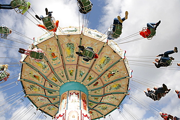 People driving with a chairoplane, Hamburg, Germany