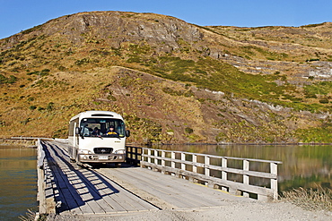 Bus crossing a wooden bridge, Torres del Paine National Park, Patagonia, Chile, South America