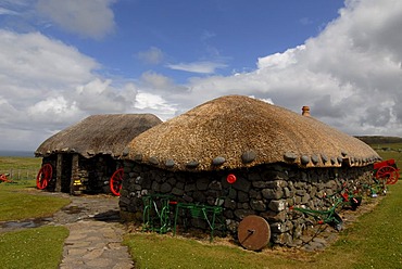 Museum of Island Life showing old turf houses on the Trooternish Peninsula, Isle of Skye, Scotland, United Kingdom, Europe