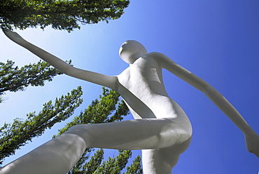 Walking Man, Sculpture in front of the building of the Muenchener Rueckversicherung, Leopoldstrasse, Munich, Bavaria, Germany