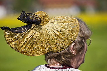 Woman wearing a golden bonnet at the Gauderfest 2008 Festival, Zell am Ziller, Zillertal Valley, North Tyrol, Austria, Europe