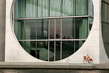 Cyclist in the government quarter Berlin, Germany