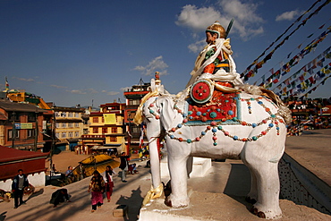 Decorated statue of elephant and rider guards the entrance to Bodnath Stupa in Kathmandu, Nepal, Asia