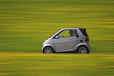 Smart car driving on a country road