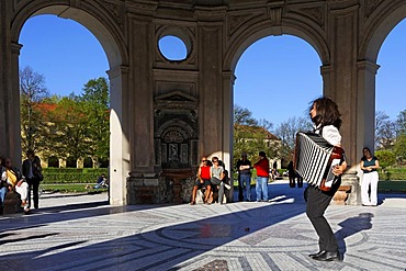 Accordionist in the Diana temple, Hofgarten, Munich, Bavaria, Germany