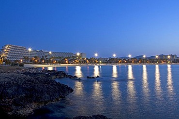 Floodlit beach of Sa Coma shortly before sunrise, Majorca, Balearic Islands, Spain, Europe