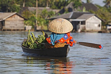 Woman on the way to floating market, Banjarmasin, South-Kalimantan, Borneo, Indonesia