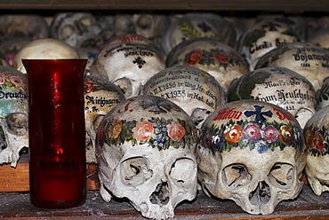 Skull skulls paint ossuary charnel house Hallstatt, Salzkammergut, upper Austria, Austria