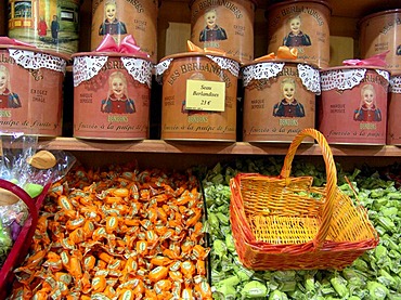 La Cite, the medieval upper city of Carcassonne. Shop with sweet goods in all possible forms and packing, multicolored and sweetly. Candied fruits and marzipan fruits.