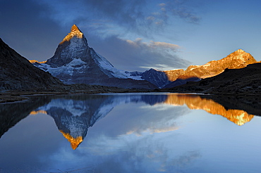 Matterhorn at sunrise at the Riffelsee, Zermatt, Valais, Switzerland