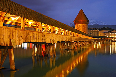 Kapellbruecke, Chapel Bridge and Wasserturm Tower at dusk, Lucerne, Switzerland