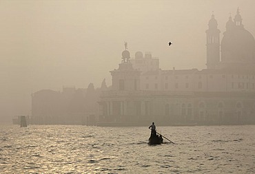 Gondola in front of Santa Maria della Salute Church in Venice, Italy