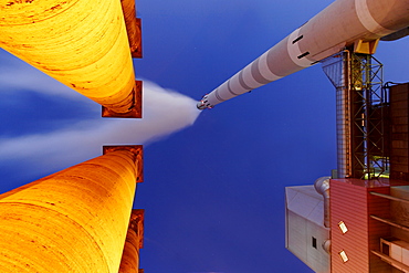 Illuminated columns at an incineration plant, Stuttgart, Baden-Wuerttemberg, Germany