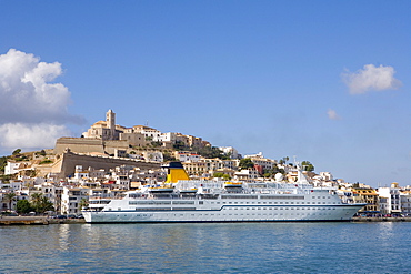 View over a ferry in the harbour of the historic city Dalt Vila, Ibiza, Balearic Islands, Spain, Europe