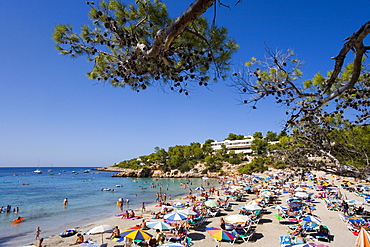 Tourists on the beach of Portinatx, Ibiza, Balearic Islands, Spain, Europe