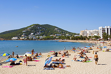 Tourists on the beach of Santa Eularia des Riu, Ibiza, Balearic Islands, Spain, Europe